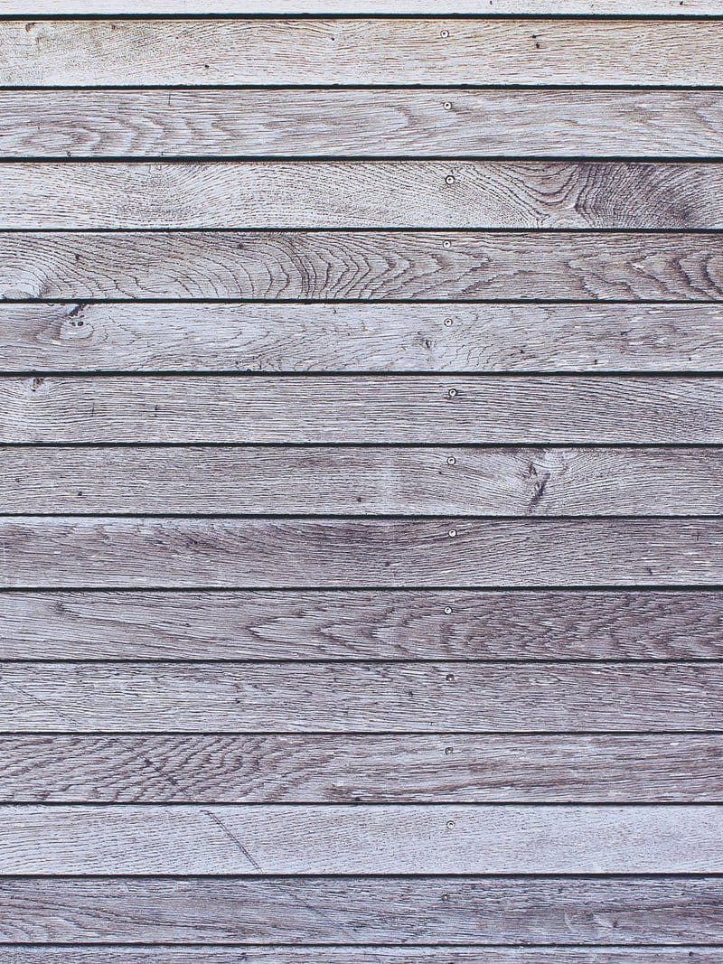 Referenzwebsite: Holzwand als Materialbild auf einer Website eines Architekten